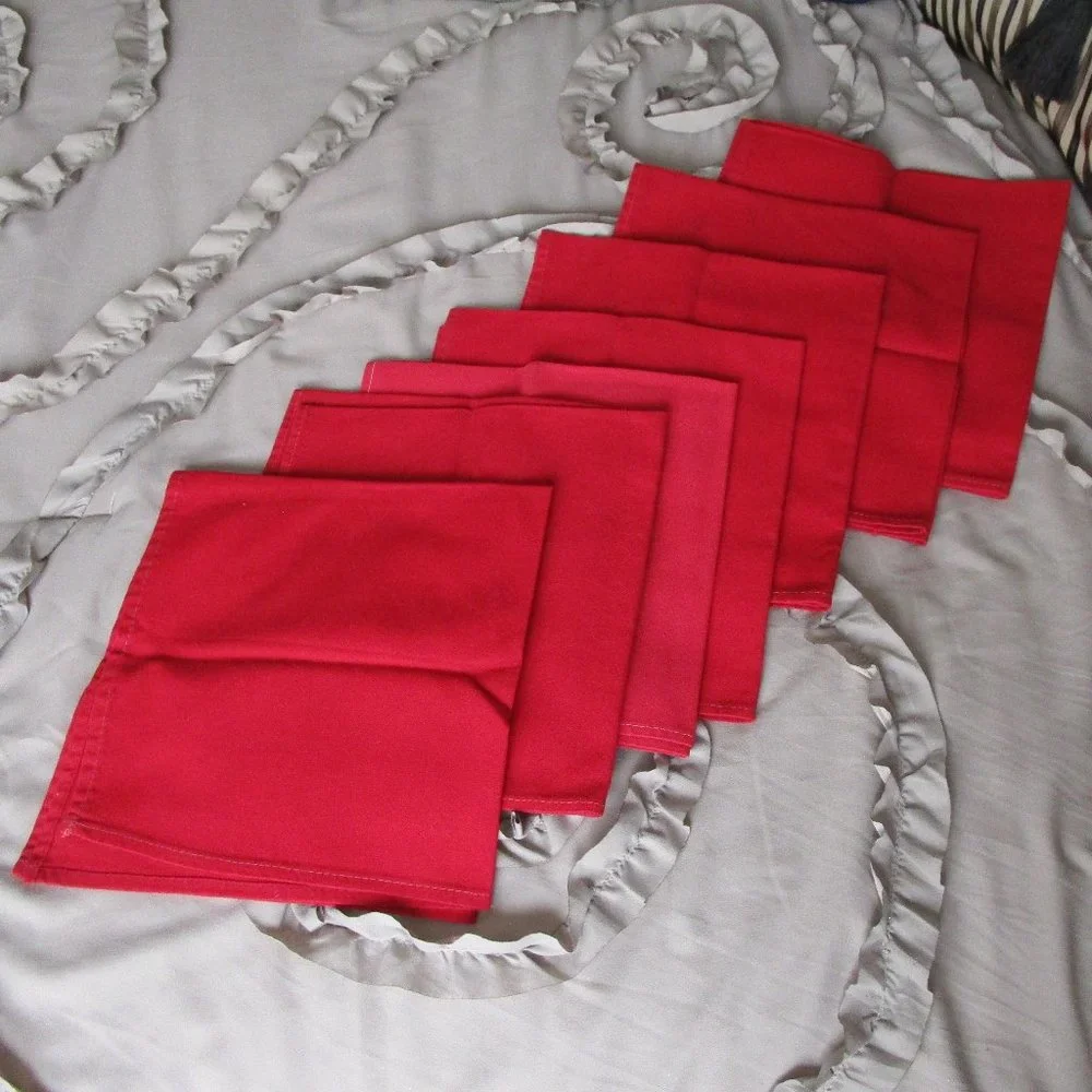 SIX red fabric napkins